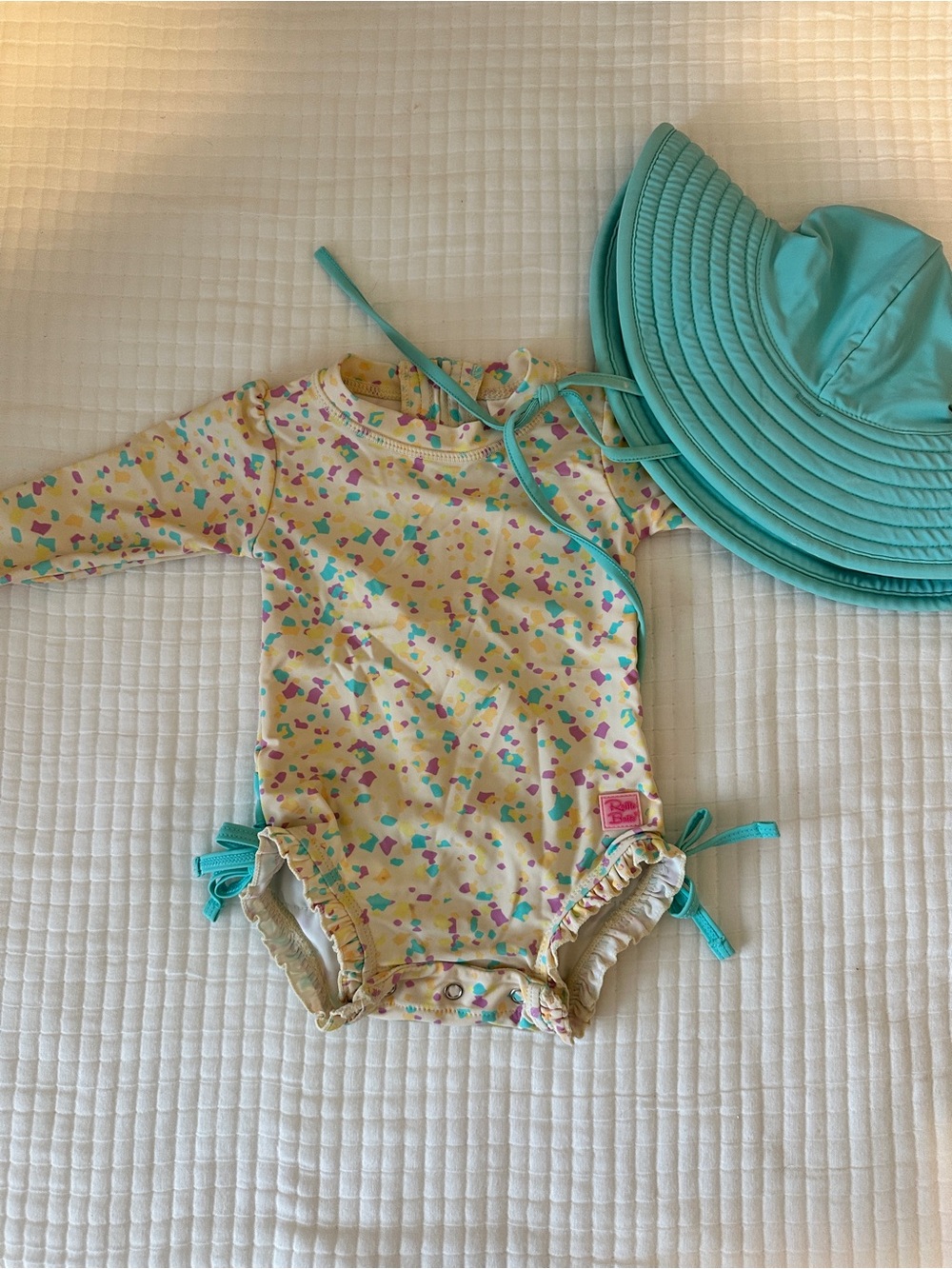 Ruffle Butts Cream Confetti Long Sleeve Rashguard with Teal Hat